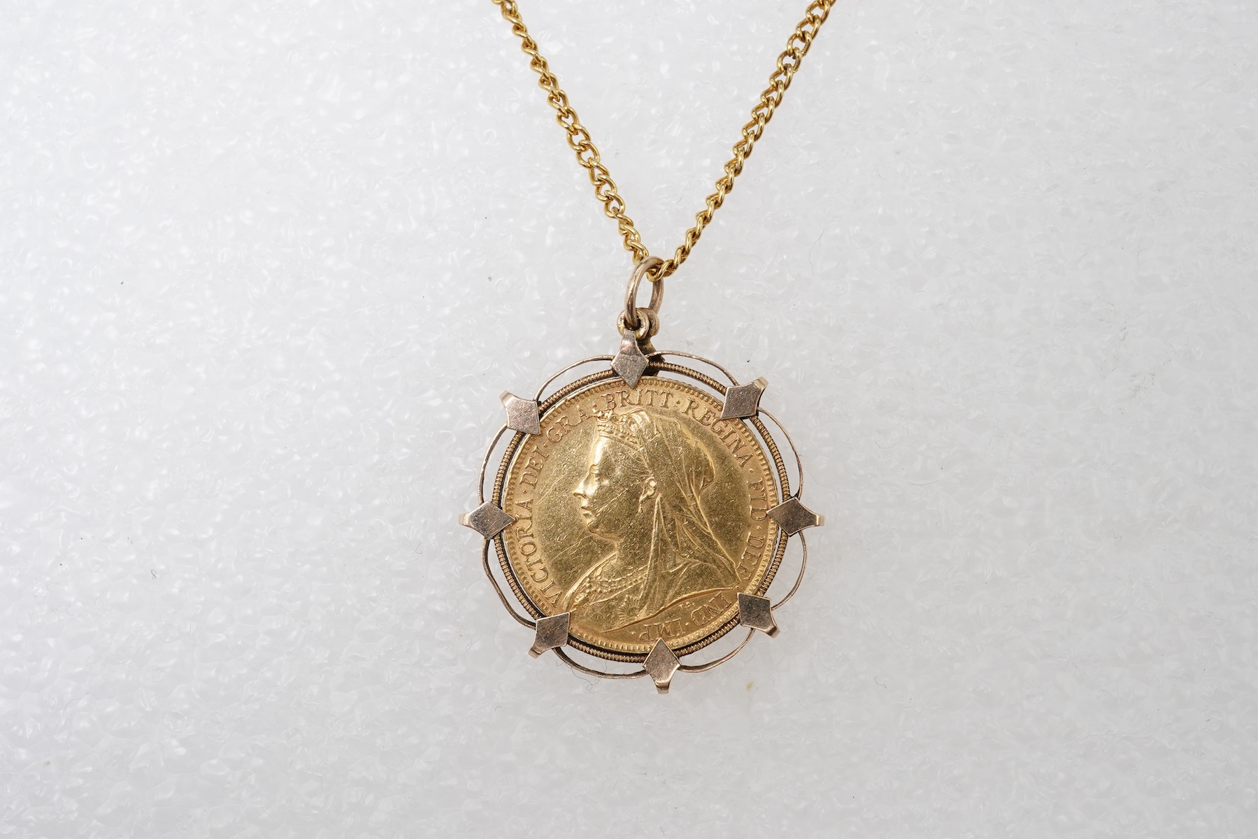 A Victorian sovereign coin pendant, circa 1898 and later